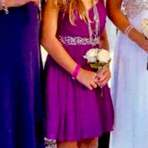 Purple mid/short dress with rhinestones.